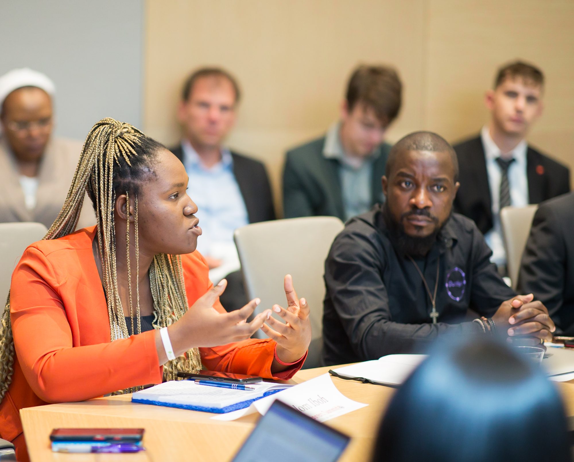 A frontline leader speaking with conviction inside her Mentor Hut.